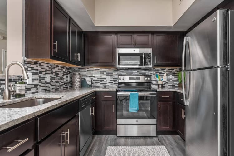 Louisville apartments for rent - image - Upgraded Kitchen with Hardwood Floors and Designer Backsplash