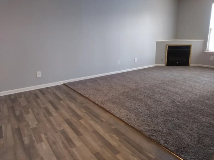 Louisville apartments for rent - image - Vacant apartment living room with a fireplace.