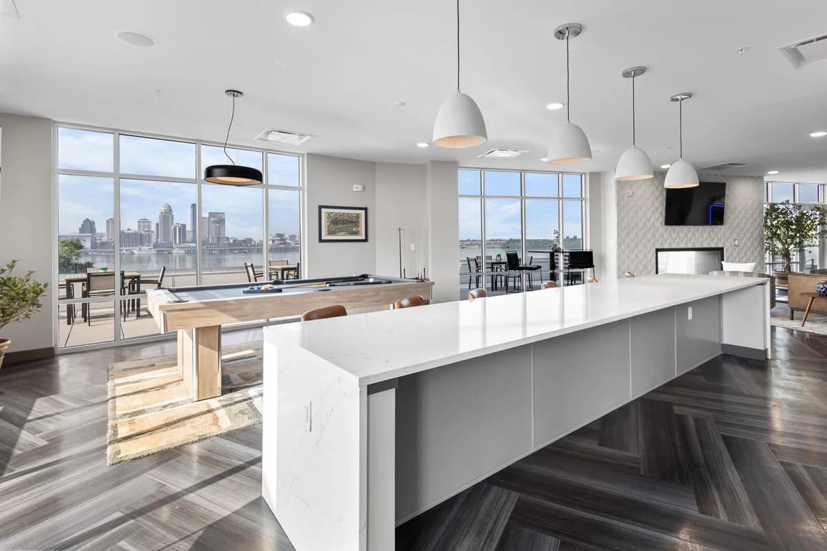 Louisville apartments for rent - image - Resident clubhouse with pool table and waterfront views