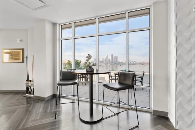 Louisville apartments for rent - image - Waterfront dining area with skyline views