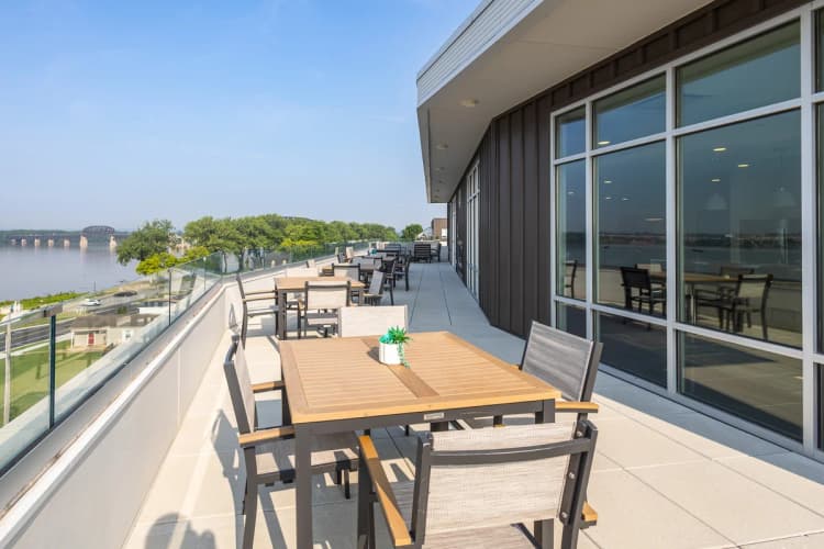 Louisville apartments for rent - image - Rooftop terrace dining with waterfront views