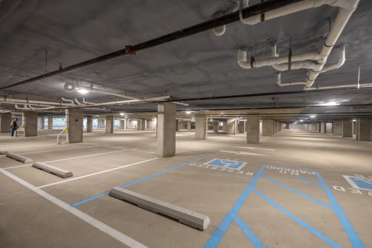 Louisville apartments for rent - image - Underground parking garage with marked spaces