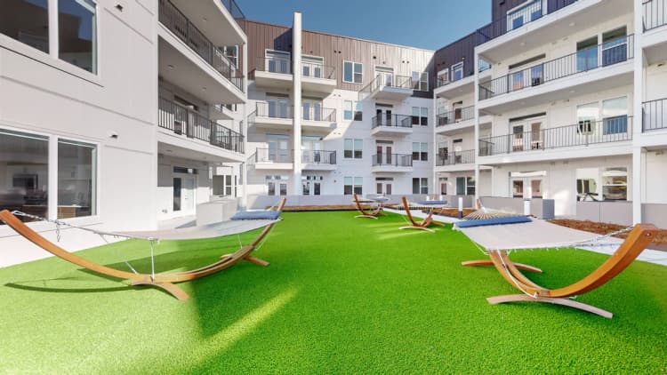 Louisville apartments for rent - image - Courtyard with hammocks and artificial turf