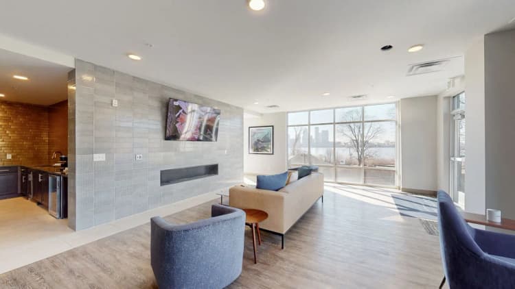 Louisville apartments for rent - image - Resident lounge with fireplace and community seating
