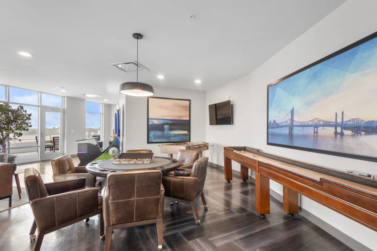 Louisville apartments for rent - image - Game room with foosball shuffleboard and lounge seating