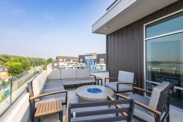 Louisville apartments for rent - image - Rooftop terrace with fire table and seating