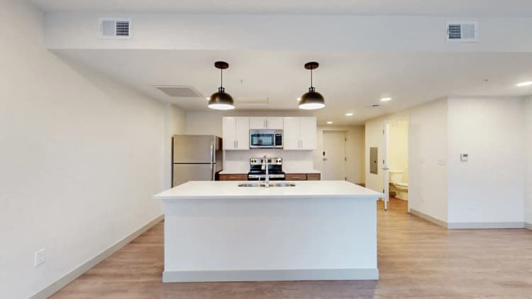 Louisville apartments for rent - image - Modern kitchen with island and pendant lighting