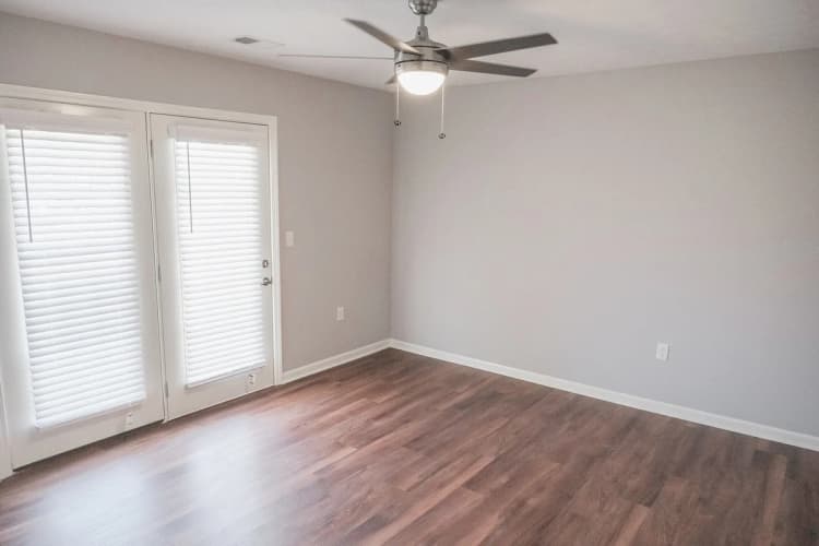 Louisville apartments for rent - image - The spacious bedroom with patio access